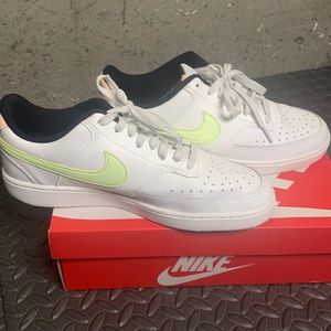 White and lime green Nike sneakers